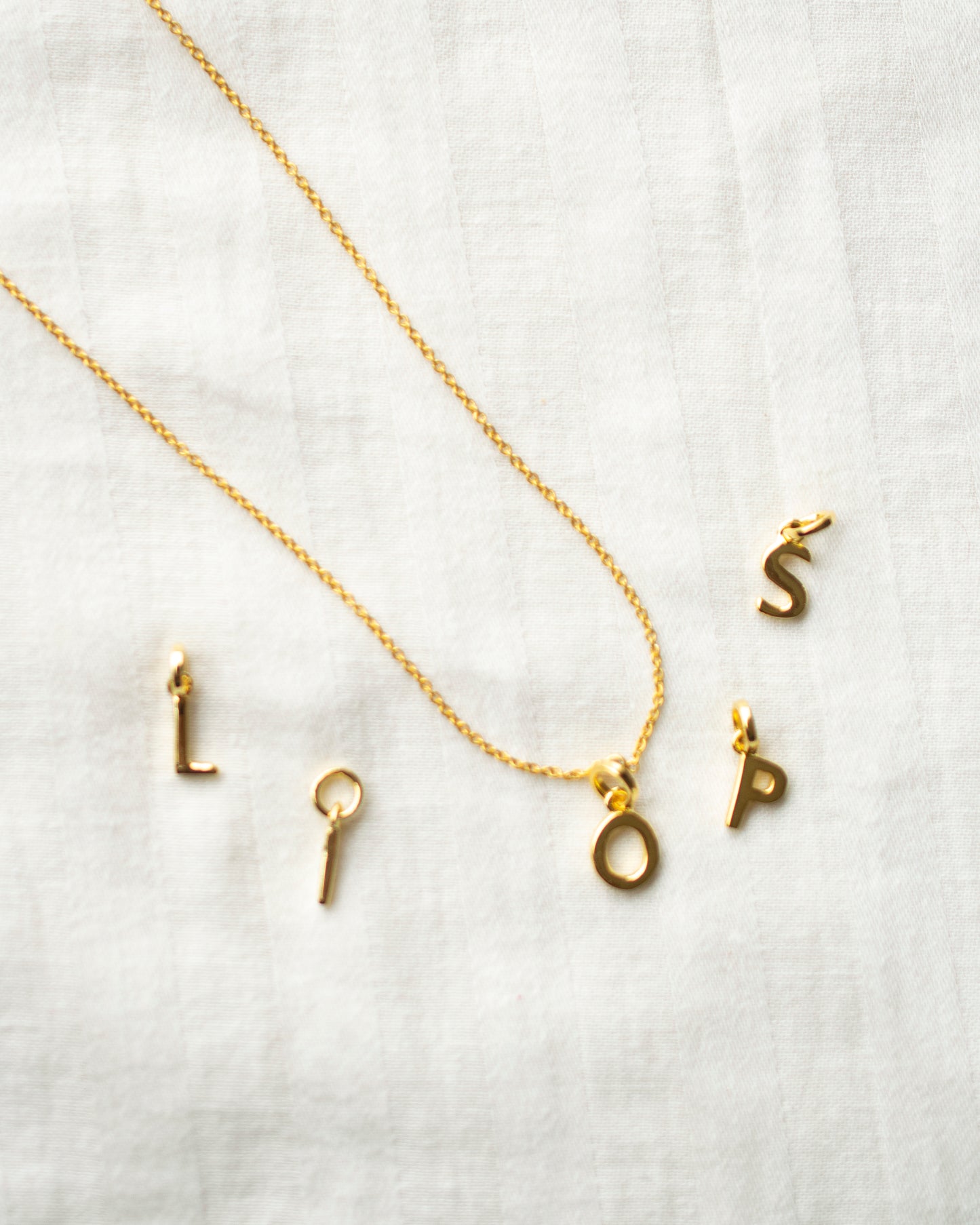 INITIAL CHARM NECKLACE